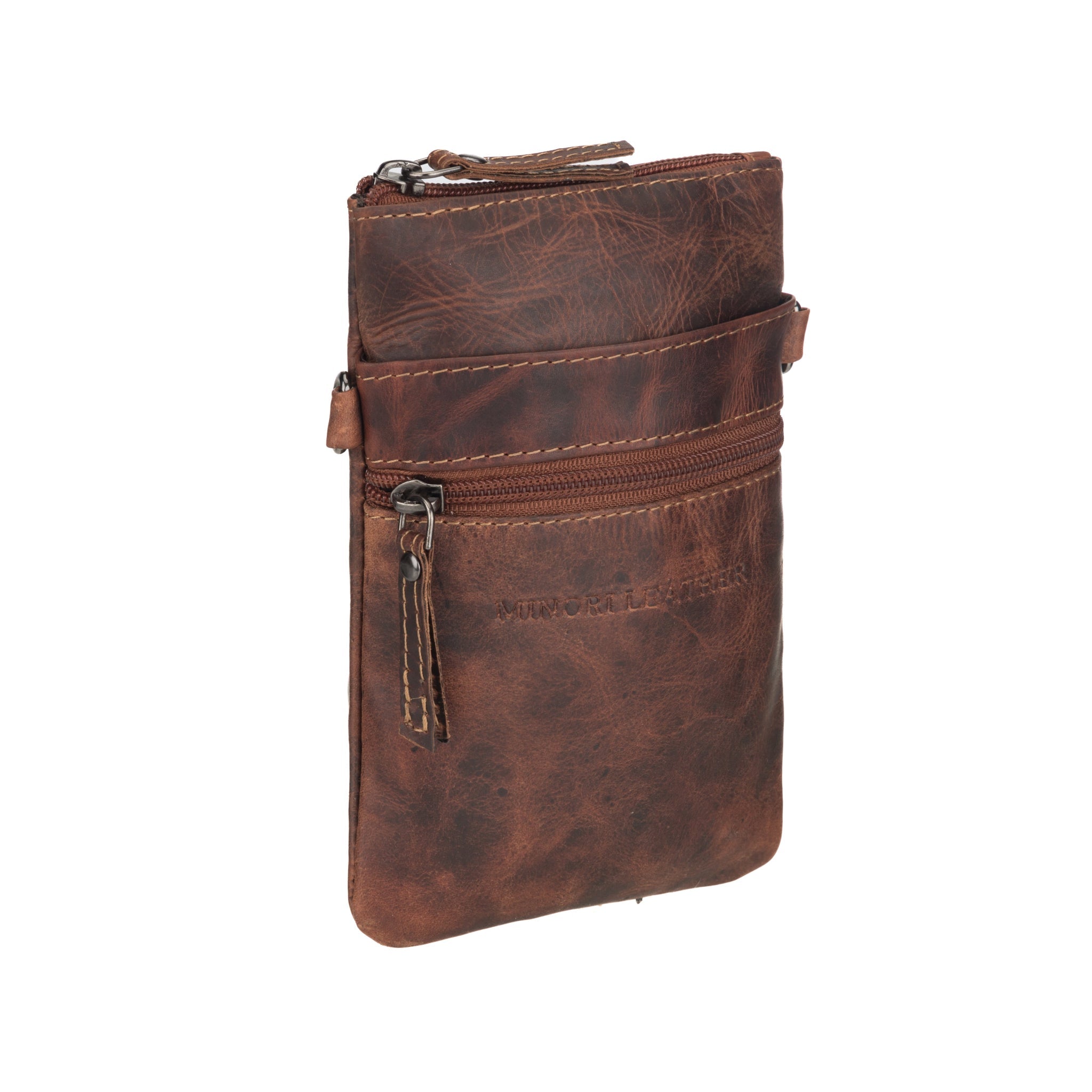 Minori Leather Ashford unisex chestnut leather sling bag with adjustable strap and minimalist design.