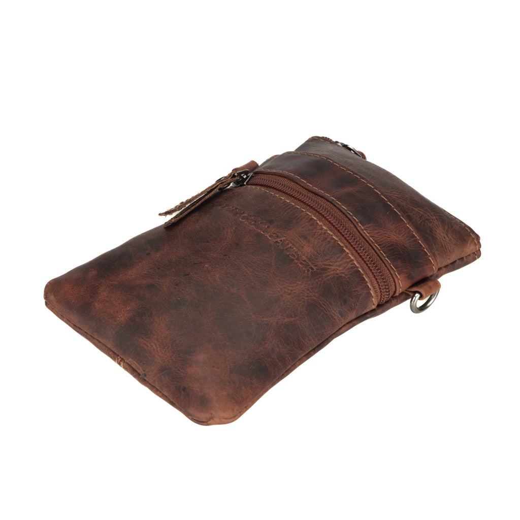 Minori Leather Ashford leather sling bag in chestnut, unisex design with adjustable strap and compact style for everyday use.