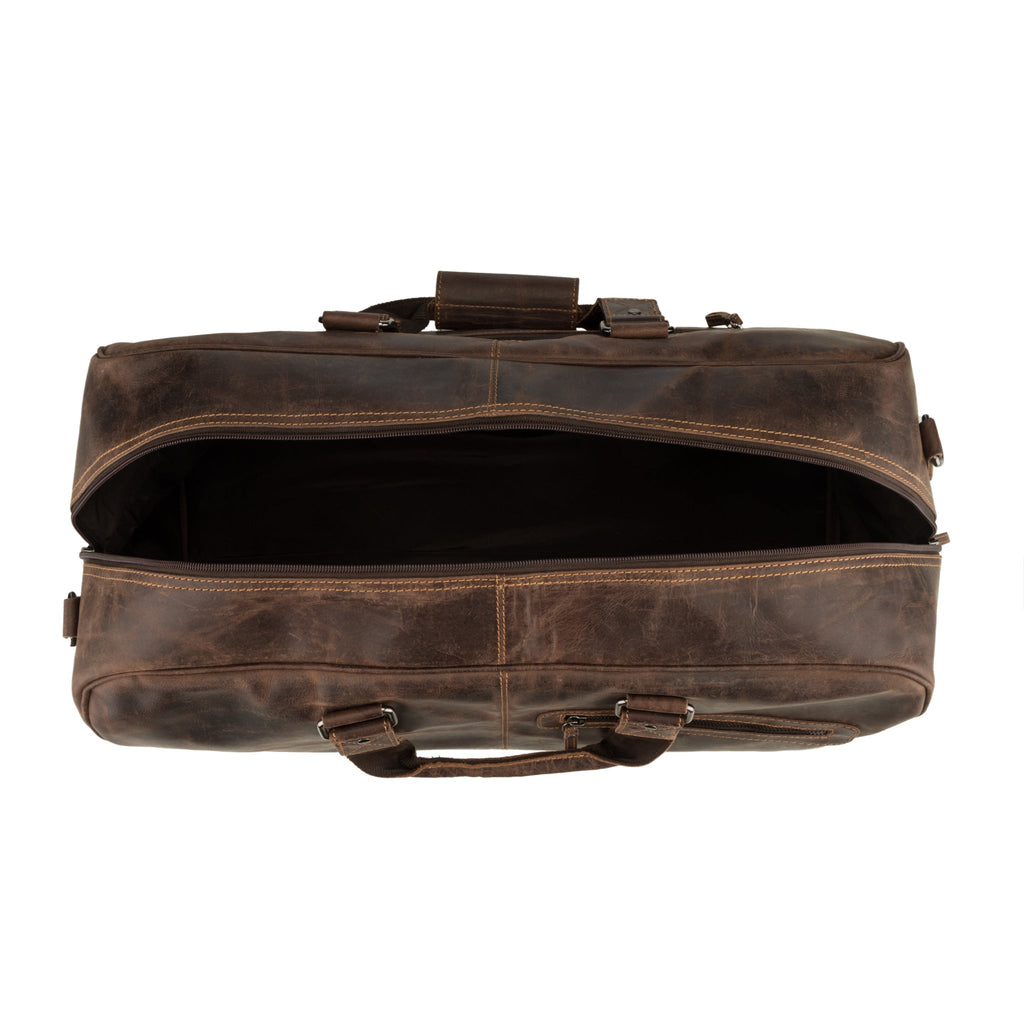 Brown Hudson leather duffle bag by Minori Leather, unisex design with sturdy handles and spacious interior for travel or gym use.