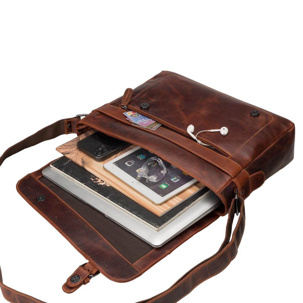 Minori Leather 14-inch chestnut leather messenger bag with adjustable strap and spacious interior for laptops and essentials.