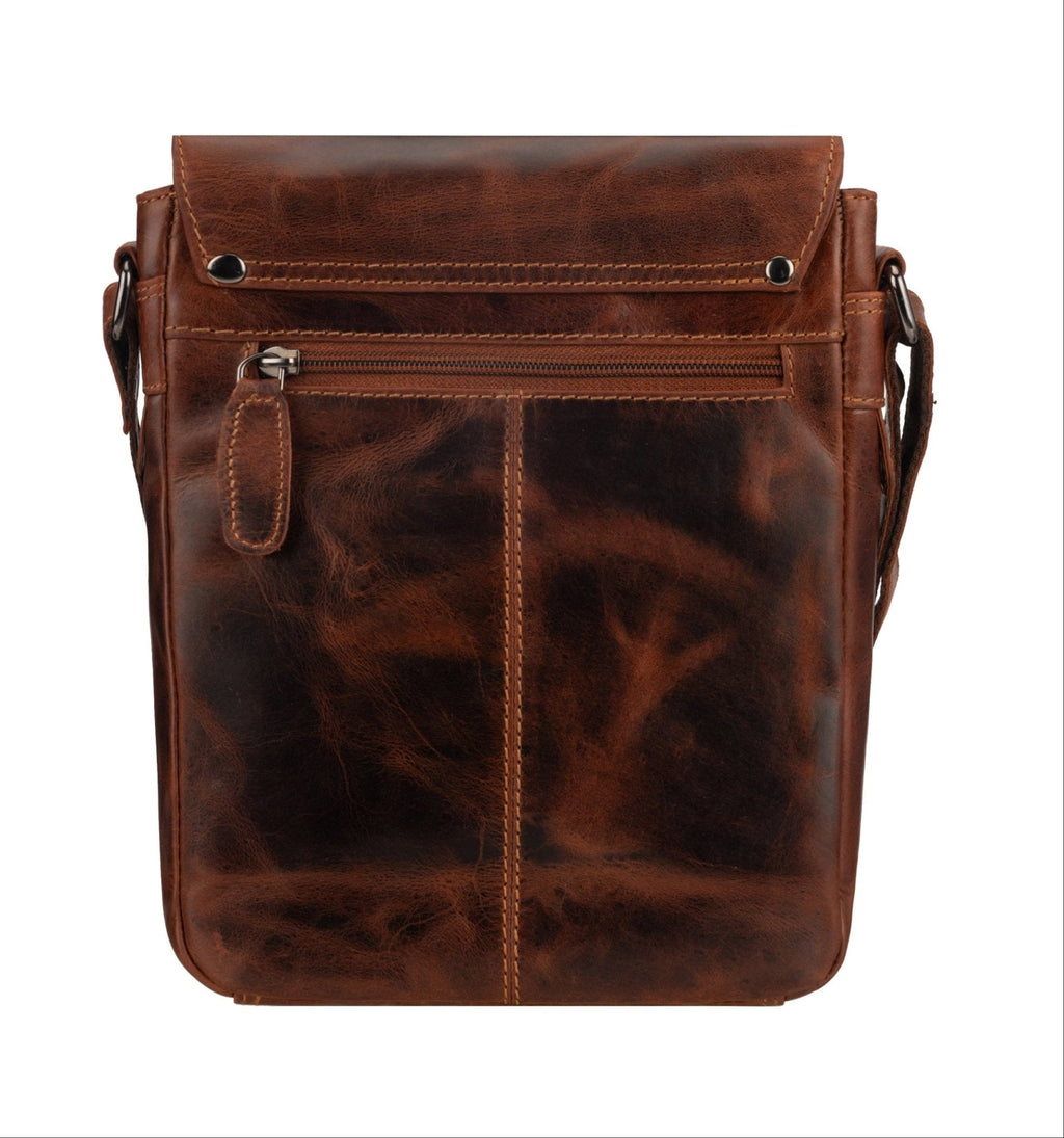 Minori Leather Dallas crossbody bag in chestnut leather with adjustable strap and front pocket, stylish and functional accessory.