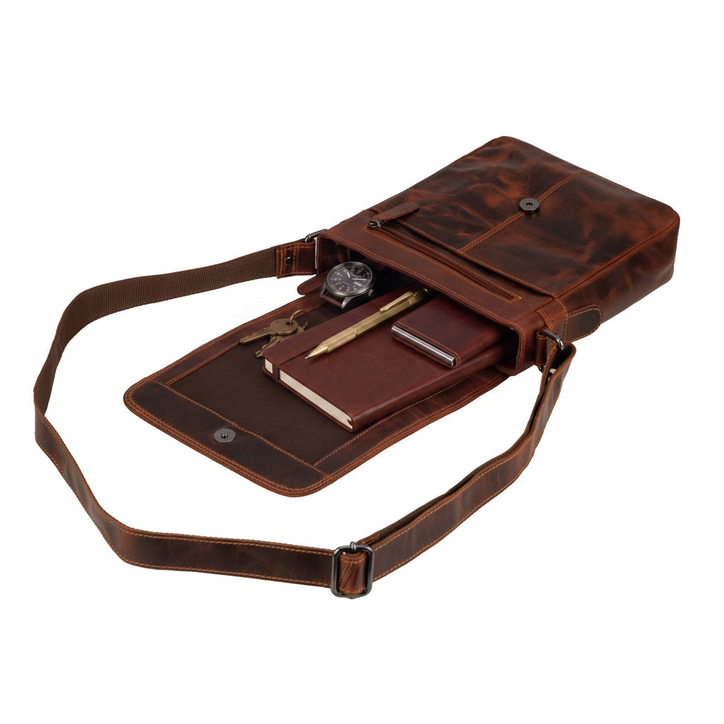 Minori Leather Halifax crossbody bag in chestnut leather, featuring a sleek design and adjustable strap for everyday use.