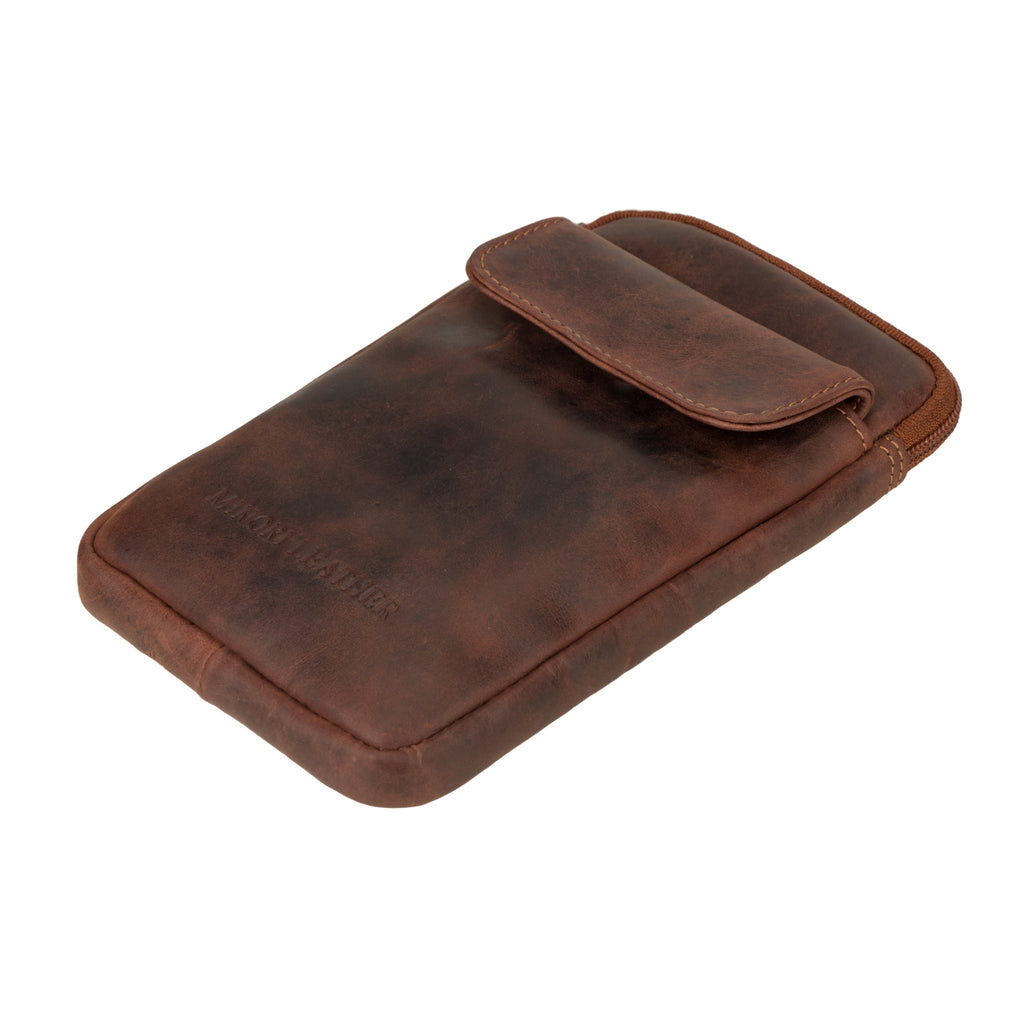 Minori Leather Freya sling bag in chestnut leather, unisex design with adjustable strap and minimalist style.