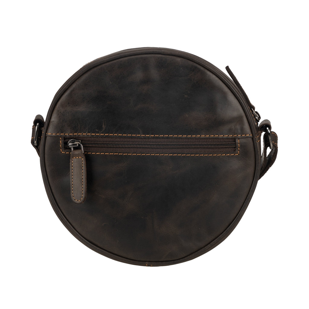 Minori Leather Luna leather round crossbody bag in chestnut, brown, and hair-on brown leather with adjustable strap.