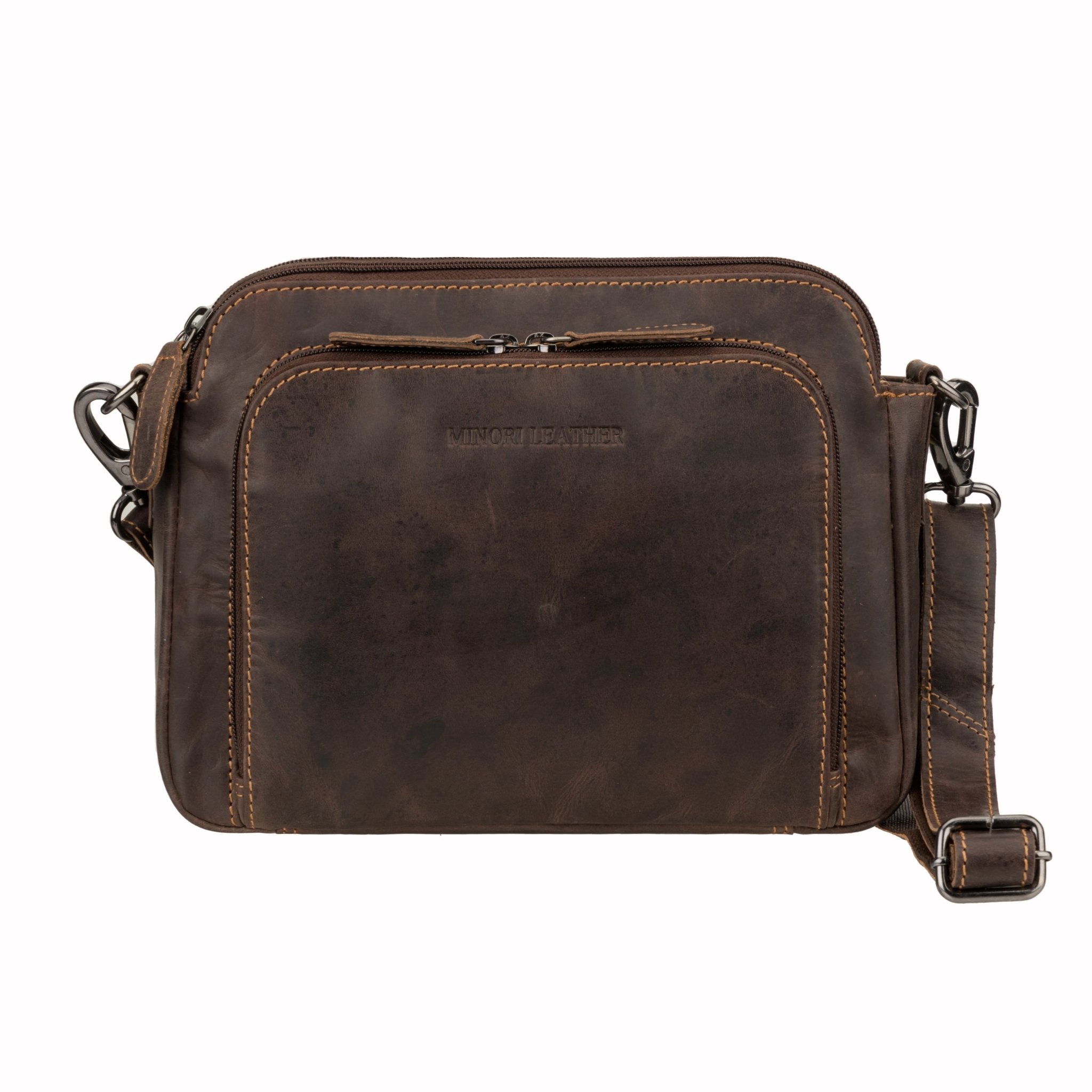 Minori Leather Ellis Brown leather crossbody bag with adjustable strap and spacious interior.