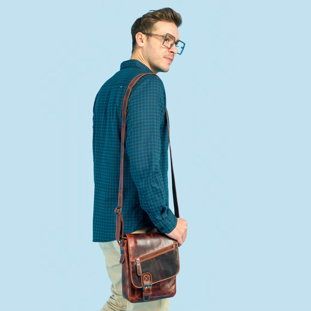 Minori Leather Dallas Crossbody Bag in chestnut leather with adjustable strap and classic design.