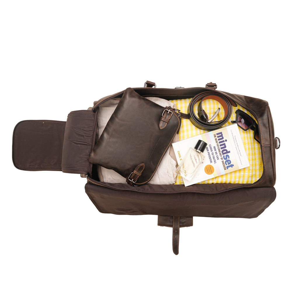 Minori Leather Miami Leather Weekender Brown duffle bag with sturdy handles and spacious interior for travel accessories.