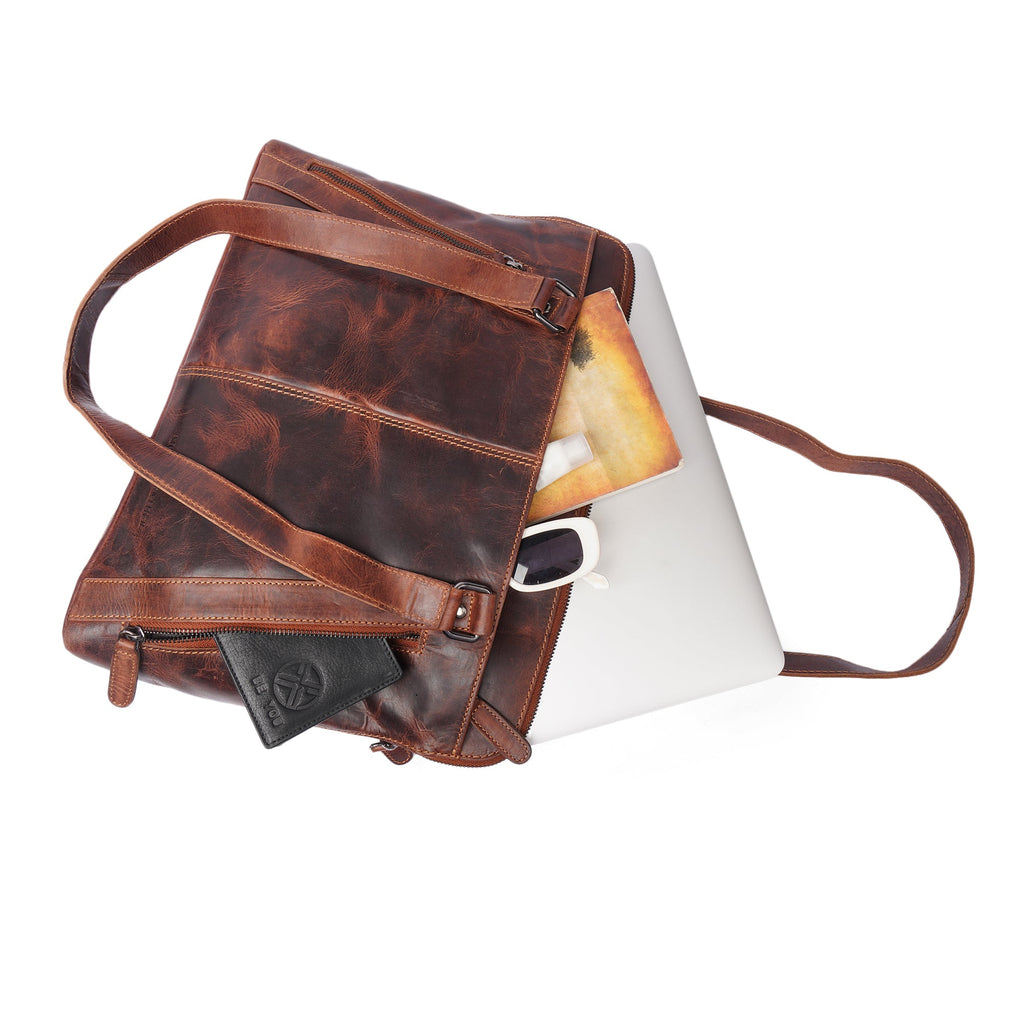 Camille Leather Laptop Tote Bag by Minori Leather, showcasing a stylish, durable brown leather tote with laptop compartment inside.