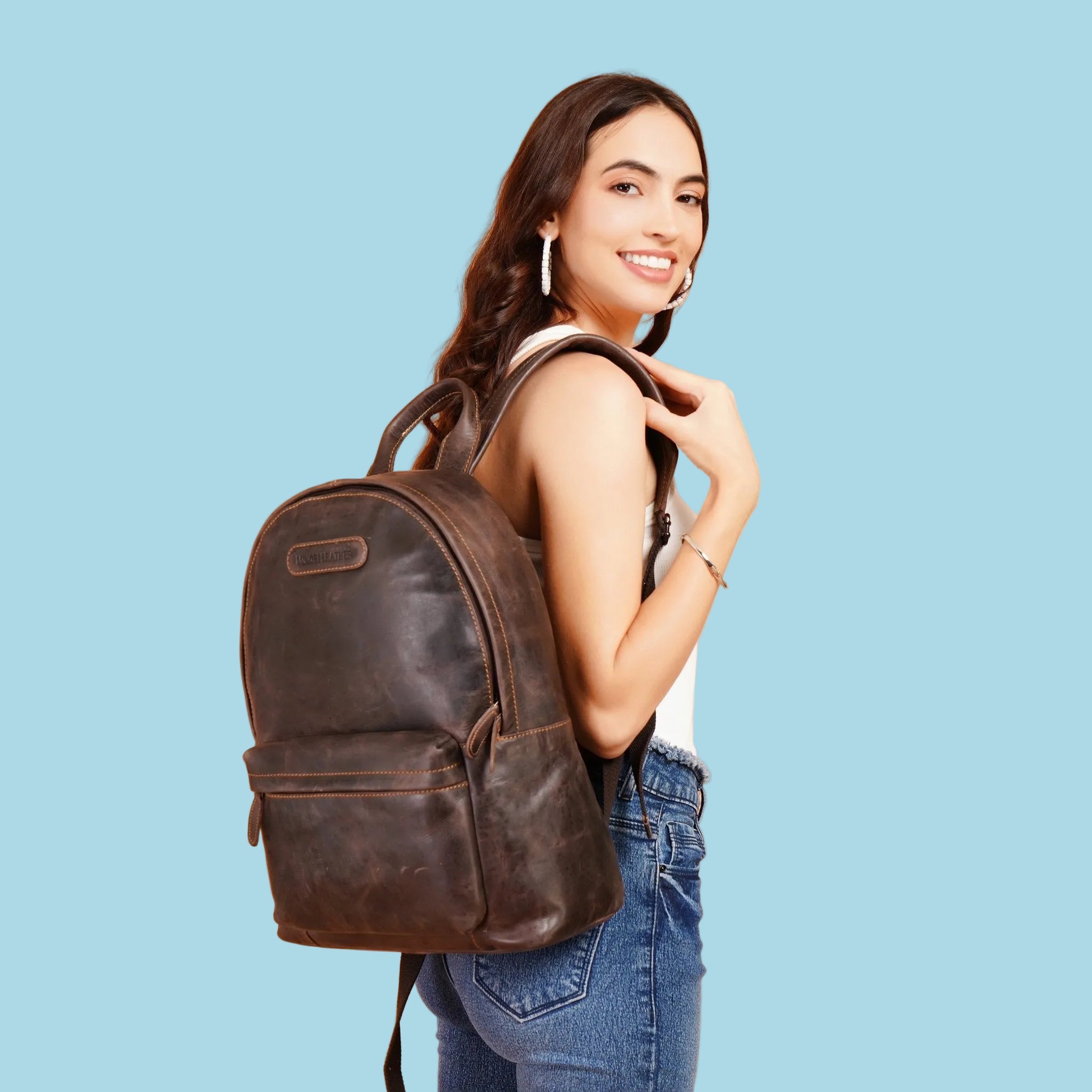 Minori Leather Garth Leather Backpack showing durable leather material and adjustable shoulder straps on a neutral background.