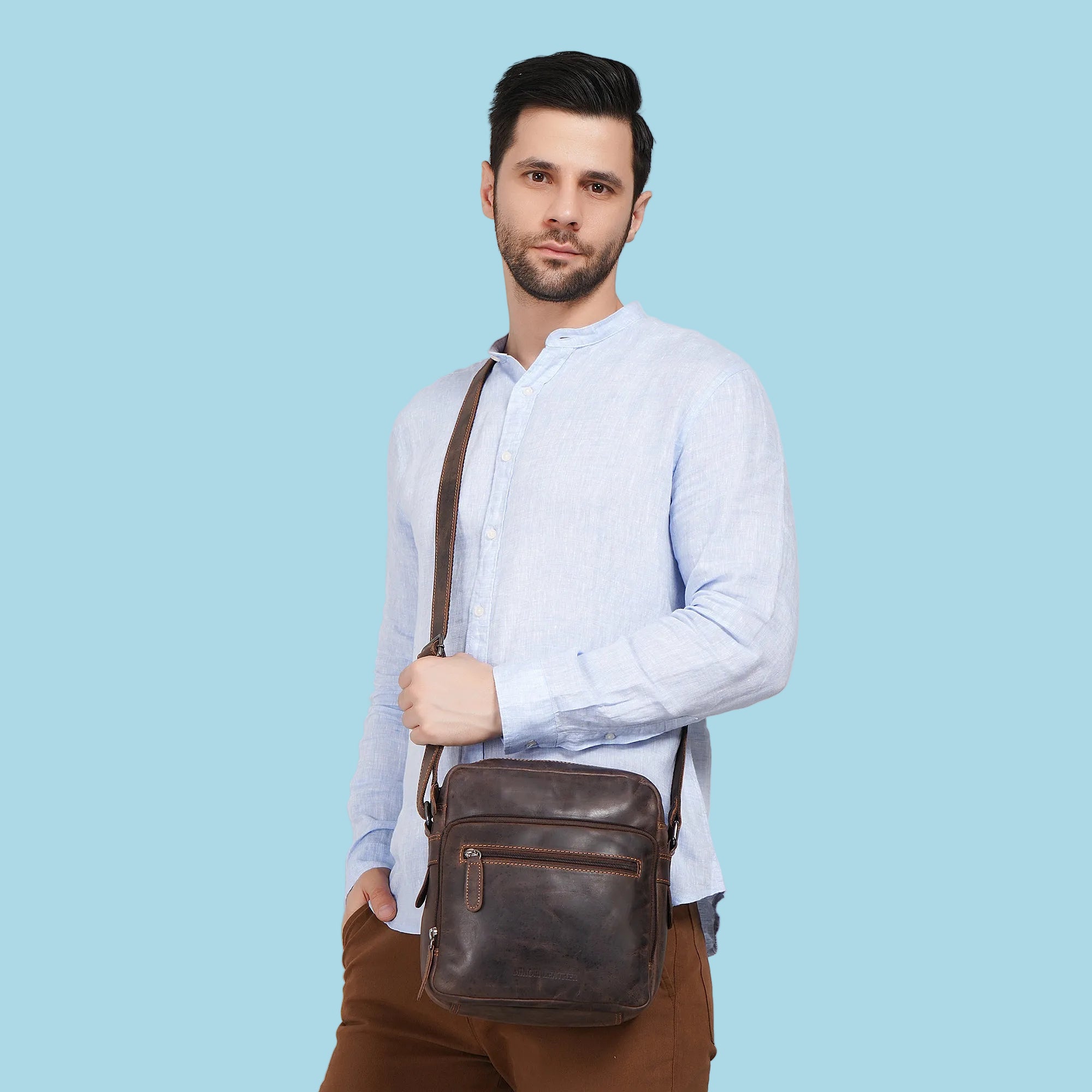 Brown Harbor Leather crossbody messenger bag by Minori Leather with adjustable strap and front pocket.