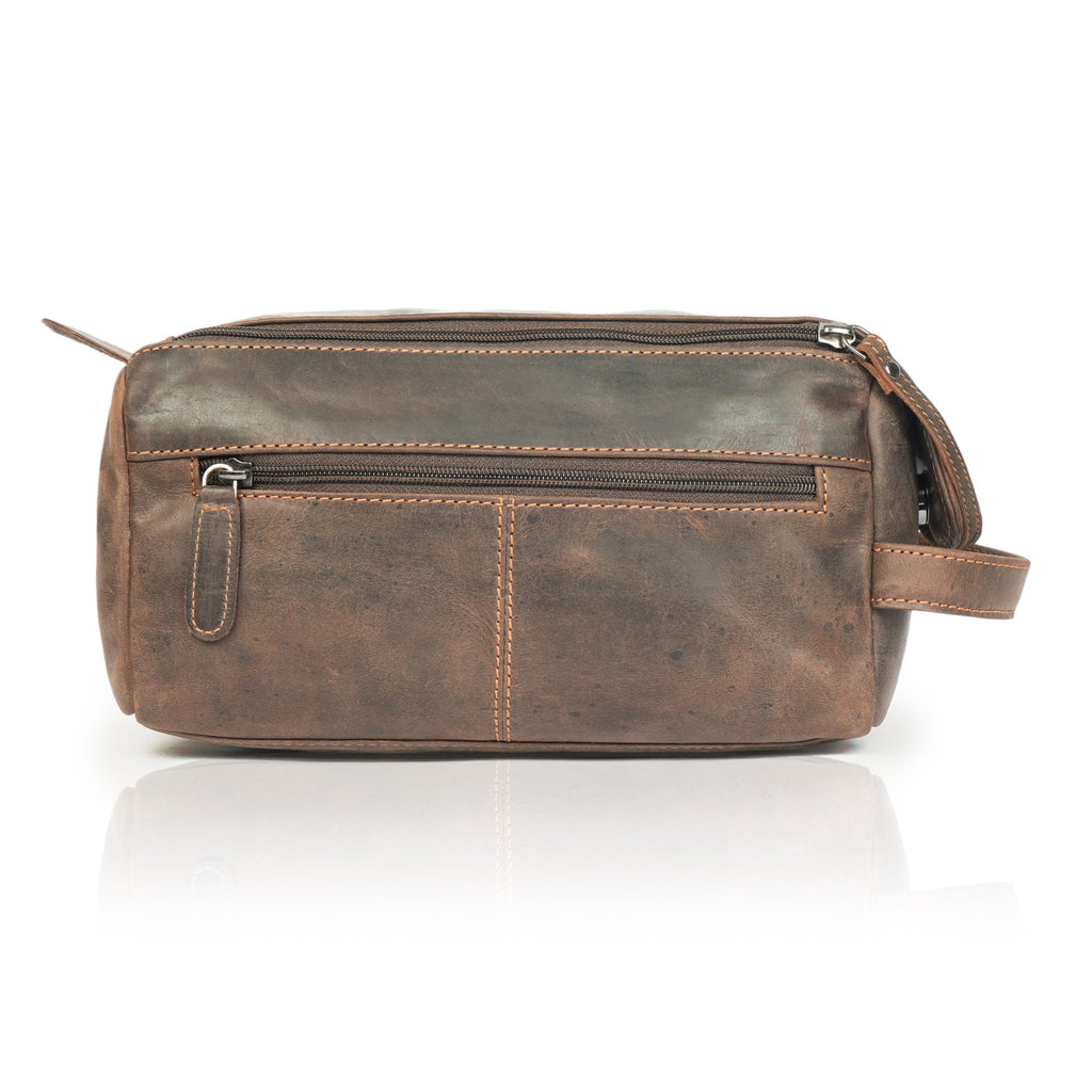 Brown premium leather toiletry bag for men by Minori Leather, featuring a sleek, compact design for travel essentials.