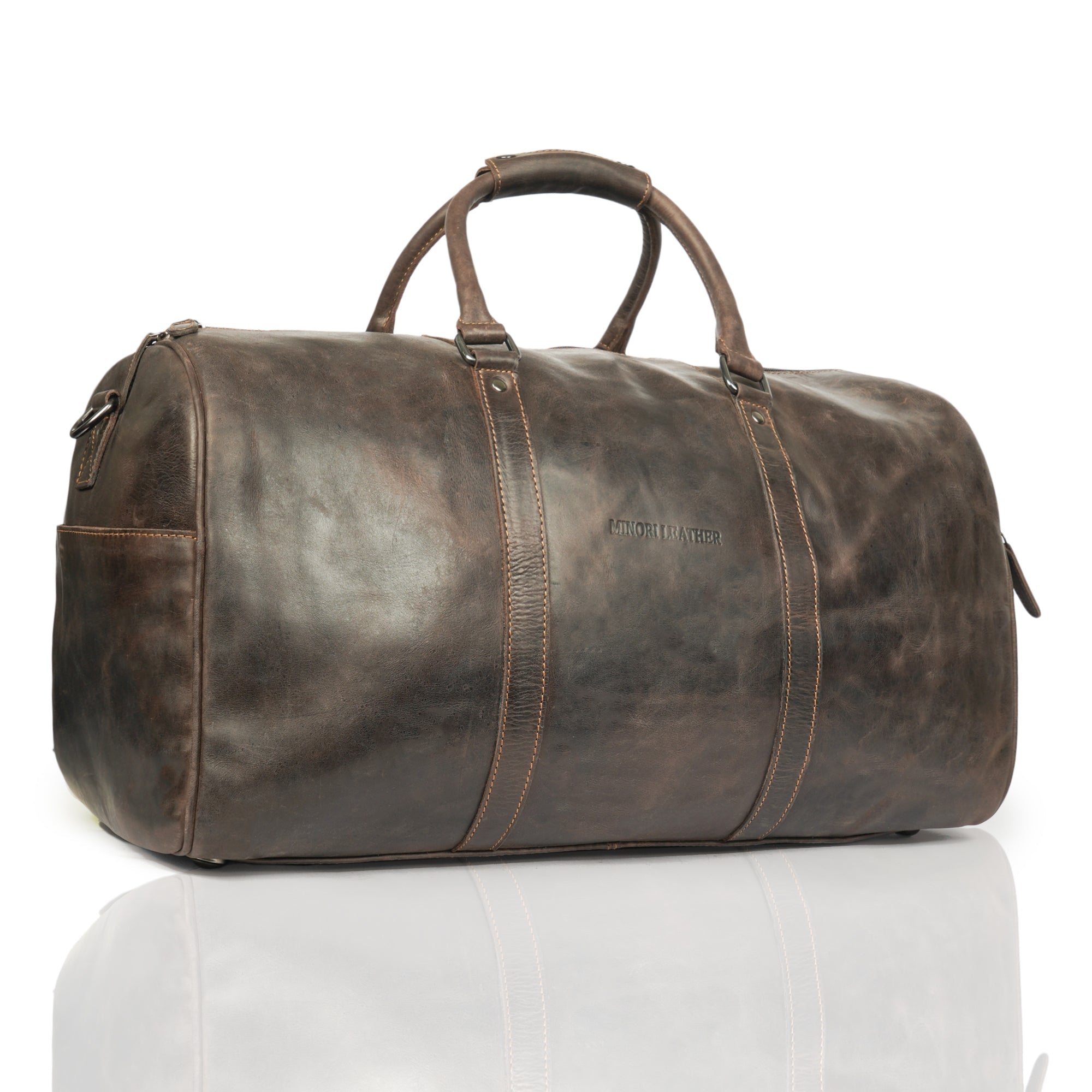 Minori Leather Jackson leather weekender duffle bag with sturdy handles and spacious interior, perfect for travel.