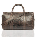 Brown Riley Leather Duffle Bag by Minori Leather with sturdy handles and spacious interior for travel or weekend trips.